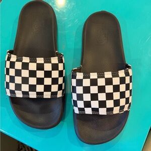Van’s Men's La Costa Slide-On sandals featuring the iconic checkerboard pattern!